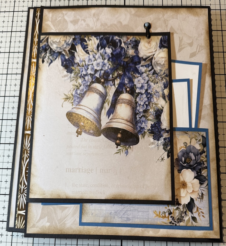 Abstract print art with bell and flower designs in frames.