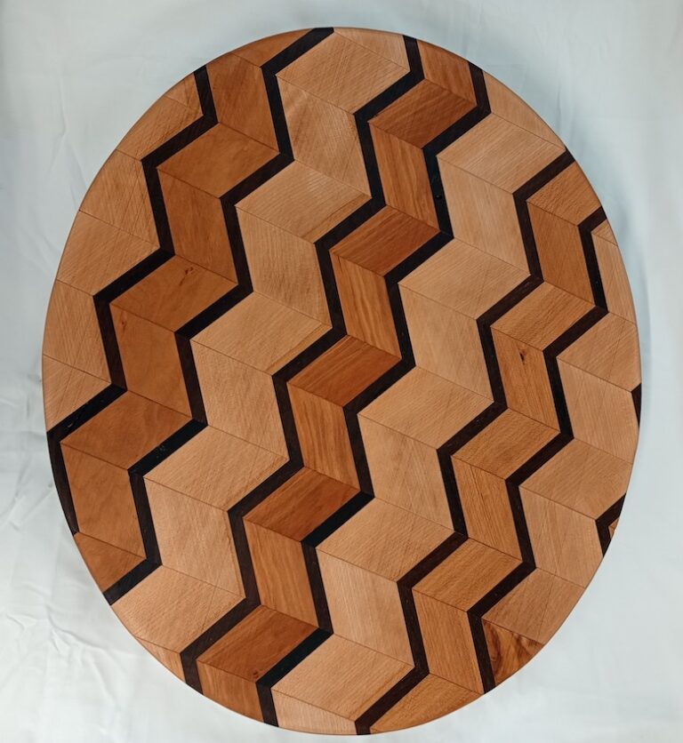 A chevron-styled wooden cutting board.