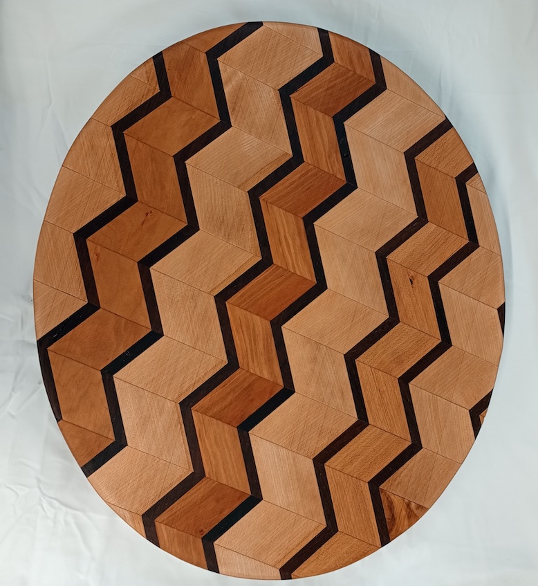 A chevron-styled wooden cutting board.