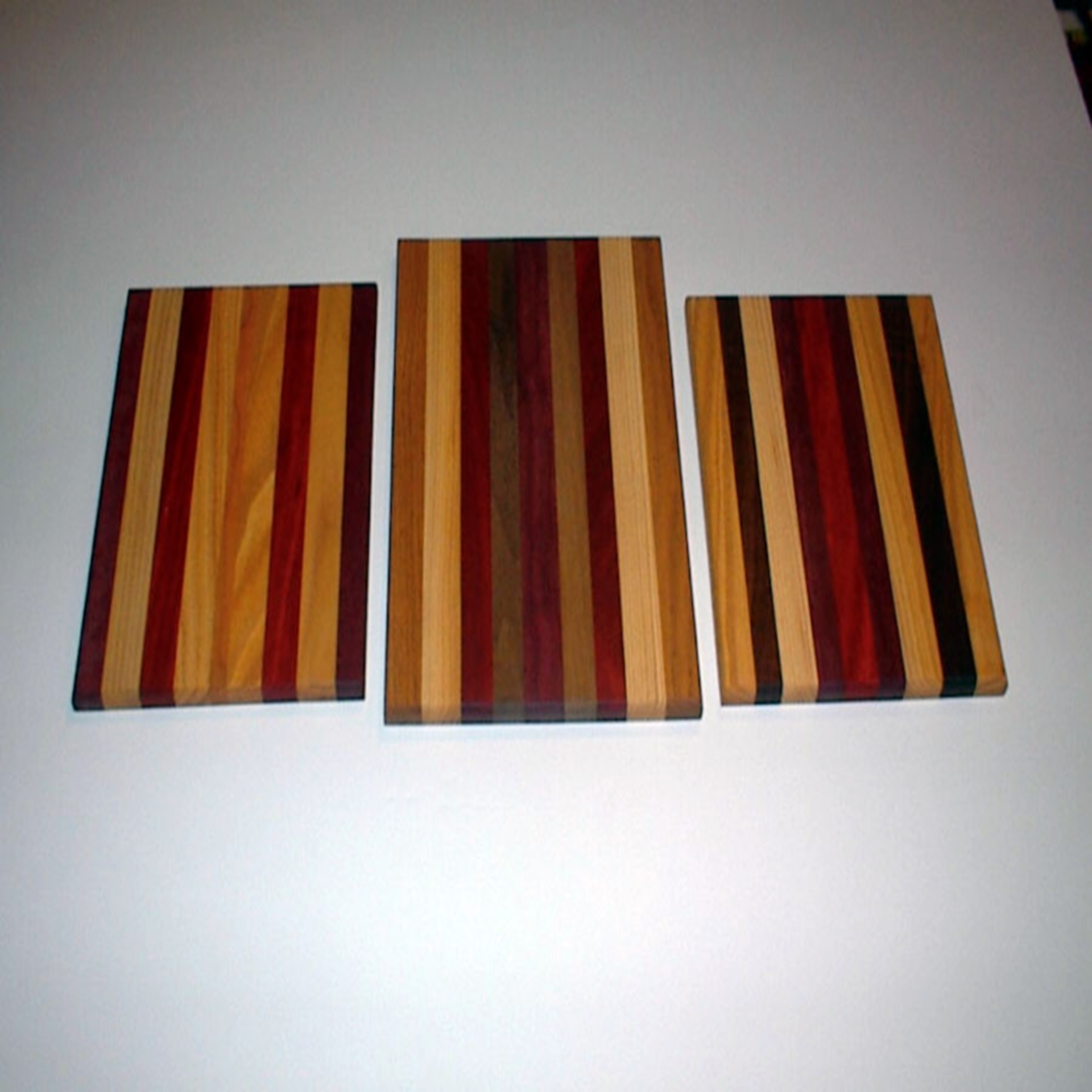 Three handmade cutting boards.