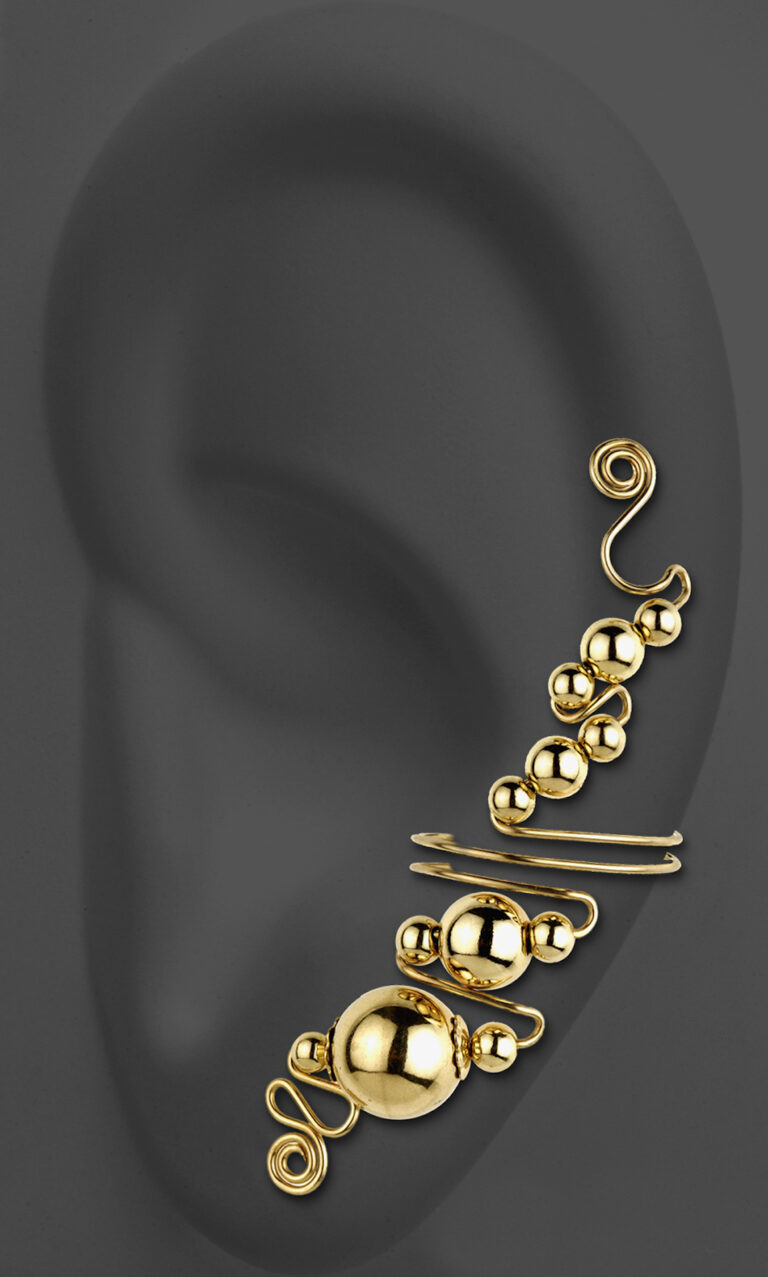 An abstract earing on a model ear.