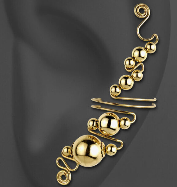 An abstract earing on a model ear.